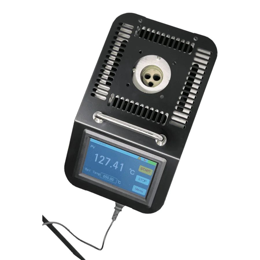 Top view of a DBC Series calibrator showing the removable soaking block seated in the well, with four probe apertures of different diameters and ventilation slots either side
