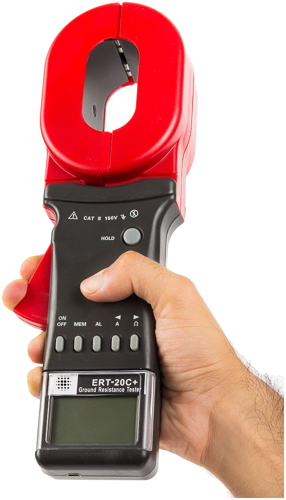 GPS LTD ERT-20C+ clamp earth tester held in the hand, showing the red clamp jaw and the keypad