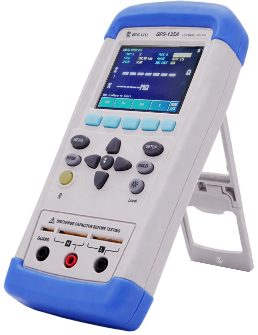 GPS LTD GPS-135A handheld LCR meter standing on its fold-out support, colour display showing the function, frequency, speed, range and equivalent circuit settings above the reading, with the five-terminal and three-terminal test slots and the guard terminal below the keypad