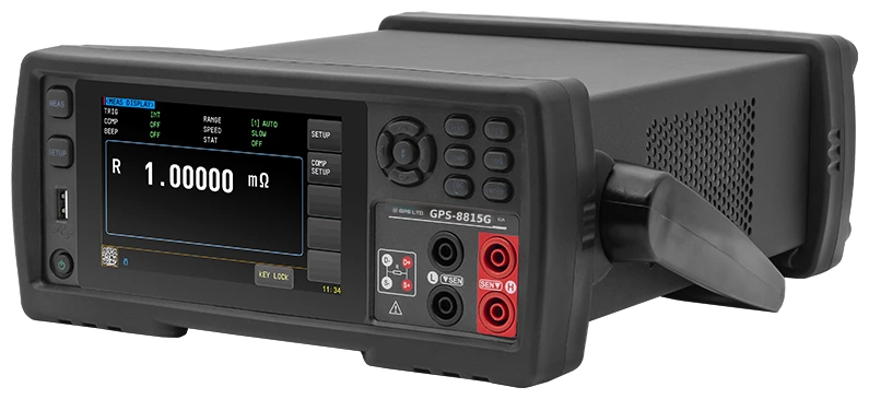GPS LTD GPS-8815G precision DC resistance meter seen from the front and side, showing the colour touch screen with the trigger, comparator, beep, range, speed and statistics settings above a milliohm reading, and the four-terminal sense and drive posts to the right of the keypad